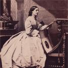 Miss Francis with portfolio of photographs
